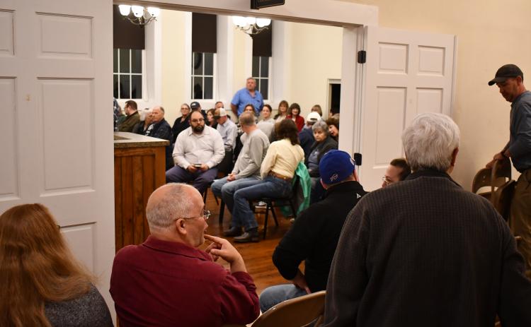 Mt. Airy had its largest crowd ever for a public meeting Wednesday night, with overflow seats being set up in the foyer of city hall. MATTHEW OSBORNE/Staff