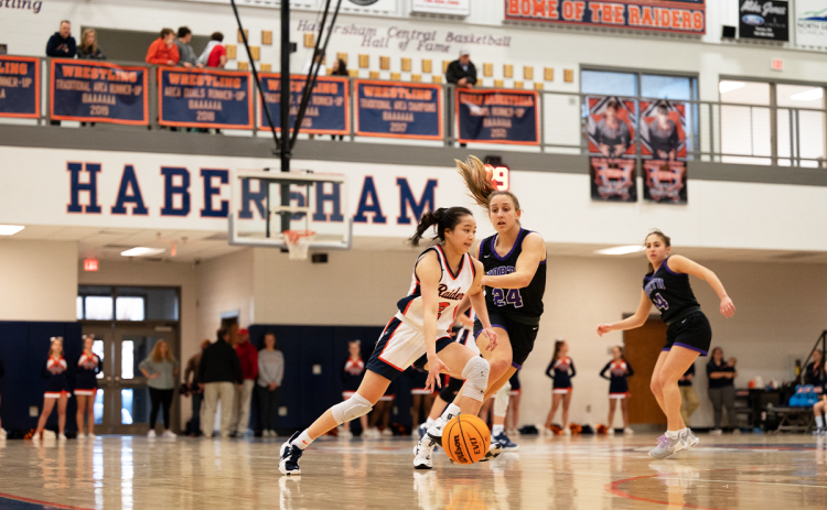 Lady Raiders Jazky Bantaum dribbles past a North Forsyth defender in Saturday night’s game. ZACH TAYLOR/Special