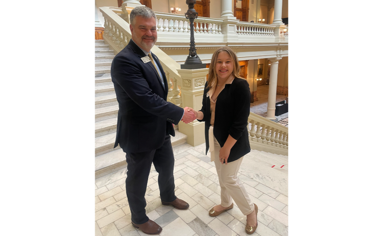 North Habersham Middle School student Marley Gallman shakes hands with Rep. Victor Anderson during her day as his page. DENNIS GALLMAN/Submitted