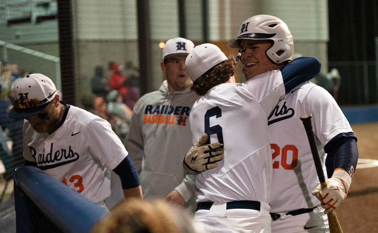 Habersham Central’s Hunter Tatum (right) and Spencer Frady (6) hug after Tatum scores  another run in the bottom of the third inning against Shiloh on Monday night. ZACH TAYLOR/Special