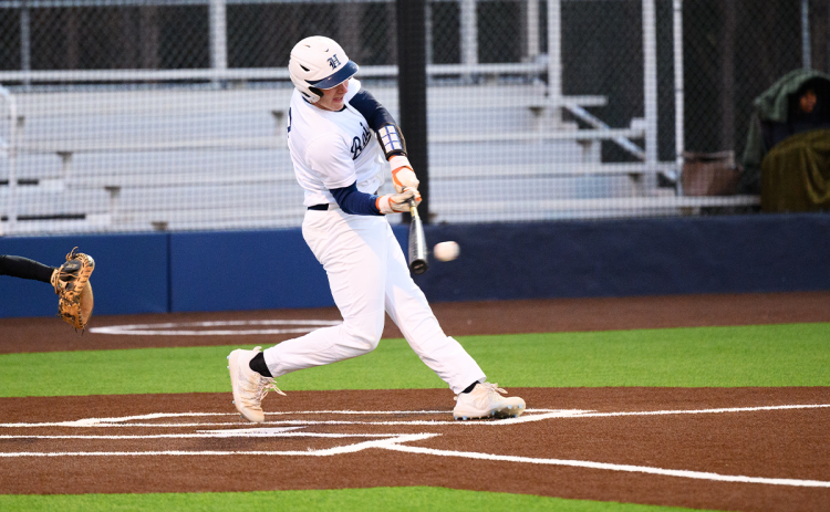 Raiders catcher Blandon Grizzle hits a hard line drive to the Shiloh left fielder in the bottom of the second inning at home March 13. ZACH TAYLOR/Special