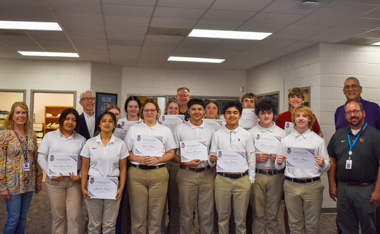 Students in the Teach One to Lead One program at the Habersham Success Academy celebrated their graduation with an ice cream party after they received their certificates from the organization. EMMA MARTI/Staff