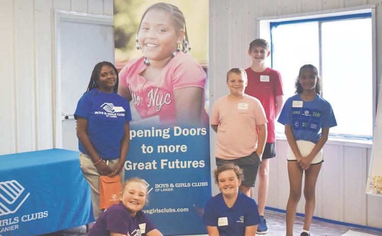 These special six Club members got the chance to chat with the board members Tuesday afternoon. From left, standing: Raigen Mathis (rising 8th grader at Bonduarant, Ky.), William Ballard (rising 6th grader at South Habersham), Gabriel Anderson (rising 9th grader at the Habersham Ninth Grade Academy) and London Garcia (rising 7th grader at Wilbanks Middle). Seated are Emma Johnson (rising 5th grader at Clarkesville Elementary) and Kyleigh Goode (rising 5th grader at Fairview Elementary). EMMA MARTI/Staff