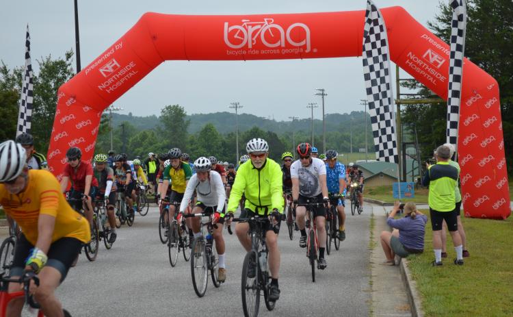 Riders with the Bike Ride Across Georgia (BRAG) spent Sunday night in Clarkesville before launching the next leg of their journey from the Ruby Fulbright Aquatic Center. MATTHEW OSBORNE and ZACH TAYLOR/Staff