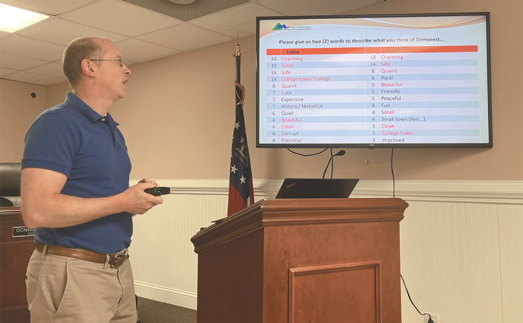 Adam Hazell of the Georgia Mountains Regional Commission makes a presentation in Demorest on Monday night. MATTHEW OSBORNE/Staff