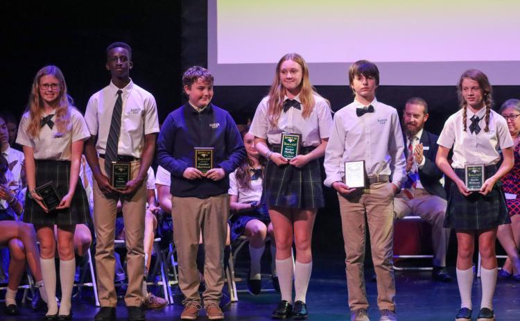 The Spirit of Rabun Gap award honorees were sixth-graders Asa White of Rabun Gap and Hattie Williams of Demorest; seventh-graders Harper Phillips of Rabun Gap and Camden Sherwood of Franklin; and eighth-graders Ayo Iyanda of Atlanta and Callie Parker of Franklin, N.C. Shown (from left) are Parker, Iyanda, Sherwood, Phillips, White and Williams.