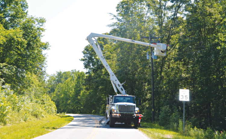 Crews for both Habersham EMC and Georgia Power worked overtime to get the lights back on in Northeast Georgia. LINDA EBERLE/CNI News Service