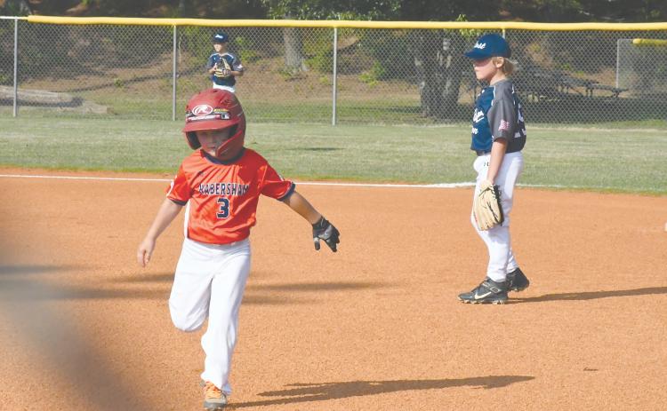 Habersham's Tobias Chastain runs back to first during the 8-U recreation tournament.