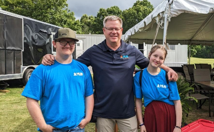 Todd Colwell (center) attends the second Annual HUB of Habersham Golf Tournament at The Orchard Golf and Country Club. The game is sponsored by local businesses, and players consisted of local community members. Left to right is Hayden Hallford and Josy Redmann. SUBMITTED