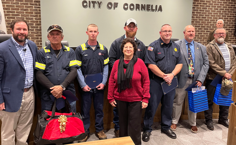 Cornelia Mayor John Borrow (left) – shown in 2021 presenting awards to longtime county employees Dale Herbert, Austin Hall, Diane Feorino, Justin Garrett, Josh Hazle, Donald Anderson and Butch Morgan – has made a connection with the community as mayor for the last 3 ½ years. FILE