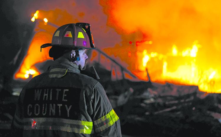 Shift Captain Jody Holland monitors the residential fire. WHITE COUNTY/Submitted