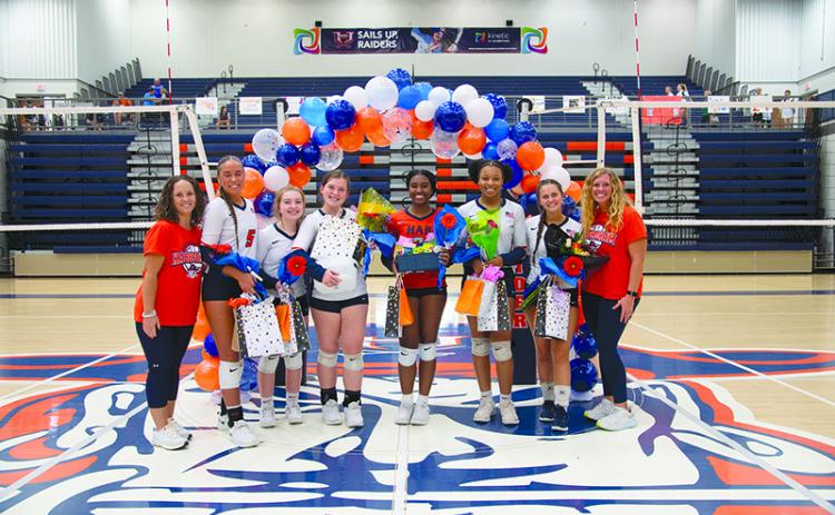 Central’s  volleyball team celebrated its seniors Thursday night before their match against Dawson County and West Hall. From left are assistant coach Savynna Smith, MaryKate Bush, Kenzie Harrison, Brooke Blackburn, Amayah Dooley, Da’Riyah Bell, Lyndee Carver and head coach Lindsay Herrin. TOM ASKEW/Special