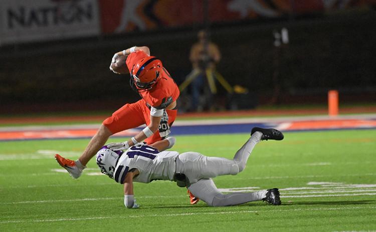 Habersham Central’s Jonah Wilson looks to break a tackle by North Forsyth defender Parker Smaltz during Friday’s home finale. TOM ASKEW/Special