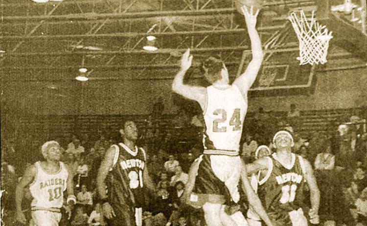 Habersham Central’s Heath Barrett (24) goes to the hoop against Newton County as part of an 18-point game Jan. 30, 2001. FILE