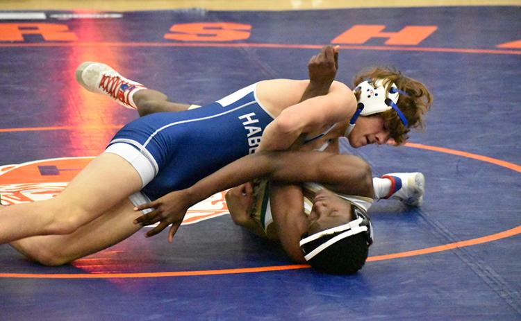 Habersham Central’s Westin Lakey gets the better of his opponent during the Raider Invitational. MATTHEW OSBORNE/Staff