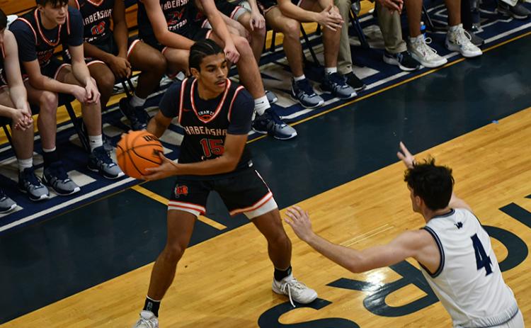 Habersham Central’s Jalen Davis looks to post the basketball during the Raiders’ win over White County on Friday. LANG STOREY/Staff