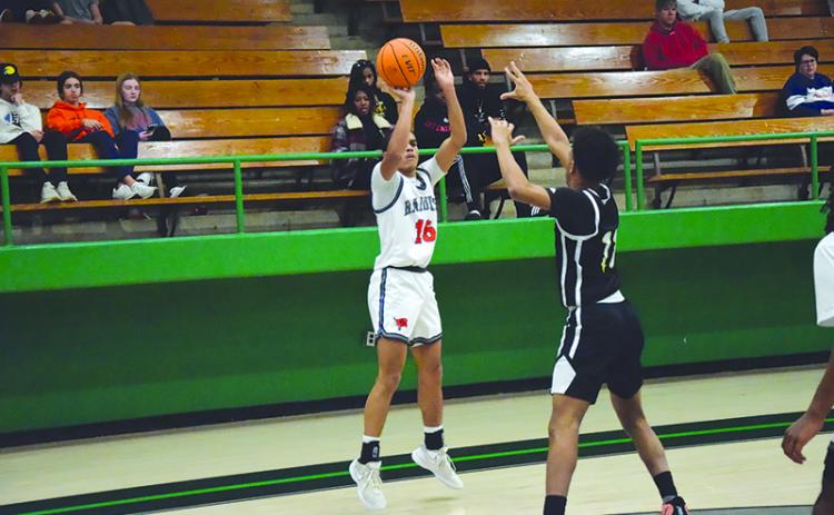 Habersham Central’s Jalen Davis fires a jumper from the corner. SHANE SCOGGINS/CNI News Service