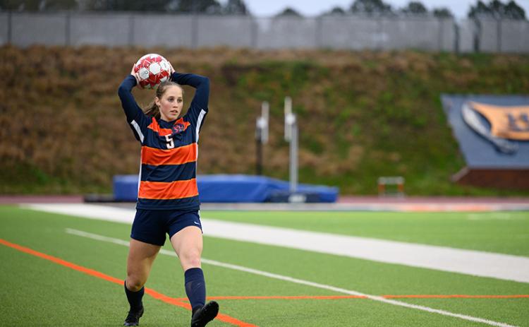 Habersham Central’s Piper Turner throws the ball back in during a match against Lanier last season. ZACH TAYLOR/File