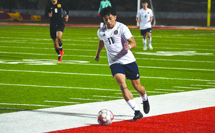 Habersham Central’s Xavier Lopez turns upfield during Monday’s exhibition. LANG STOREY/Staff