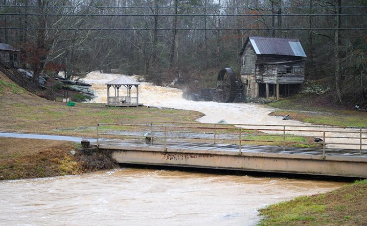 Loudermilk Mill on Highway 197 is flooded after the rain from Monday into Tuesday. The water level has risen and is close to reaching the bridge that leads to the home on the hill adjacent to the mill. ZACH TAYLOR/Special