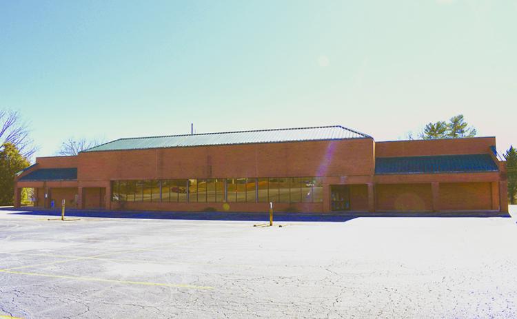 The old Ingles and Rite Aid buildings sit on West Louise Street in Clarkesville. The buildings, owned by Ingles, cause a safety hazard, Clarkesville officials said Monday. JULIANNE AKERS/Staff