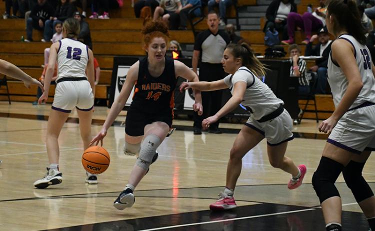 Habersham Central’s Daytona Underwood drives against a North Forsyth defender. LANG STOREY/Staff