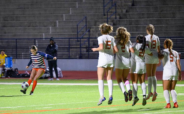 Habersham Central’s Paisley Cathey curved the ball around the Lanier wall after a penalty was called Friday night. ZACH TAYLOR/Special