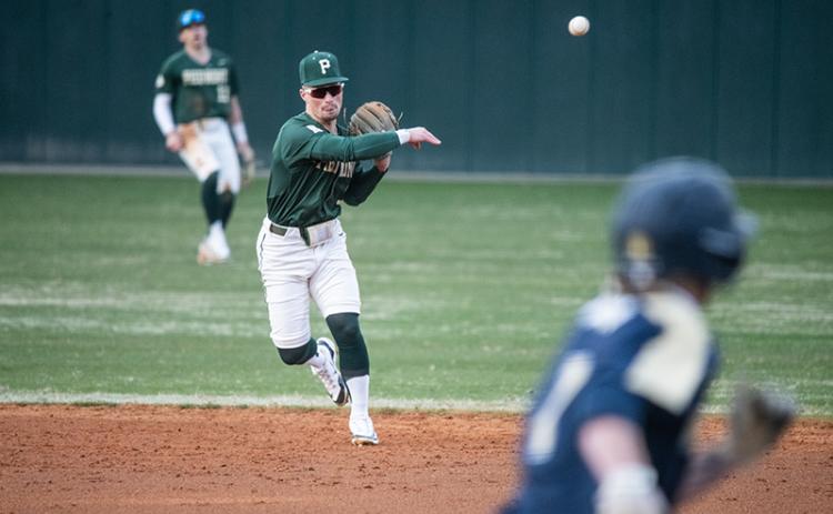 Piedmont second baseman Kolton Hicks throws the runner out at first. ZACH TAYLOR/Special