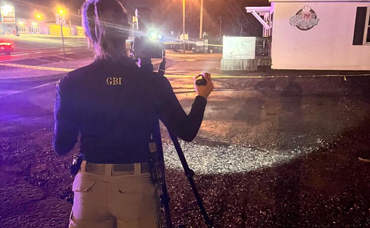 An agent surveys the scene Sunday night near Habersham Mills Road in Clarkesville. GBI/Submitted