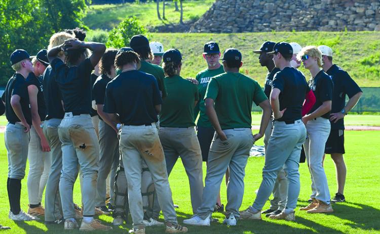 Coach AJ Pollock addresses his team during practice Wednesday. The team left for Statesboro on Thursday evening to prepare for today’s state championship games. LANG STOREY/Staff