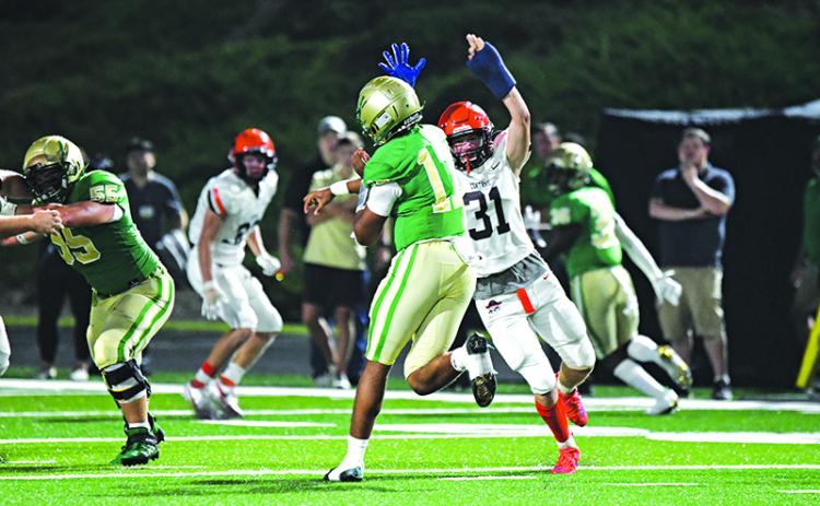 Habersham Central’s Braydon Wright rushes the quarterback against Buford in 2021. FILE