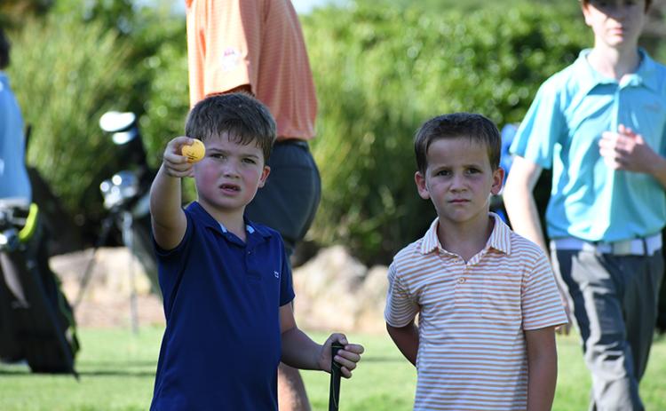 Westynn Tyre (left) and Eli Westmorland showed off inquisitive minds at Raider Golf Camp this week. LANG STOREY/Staff