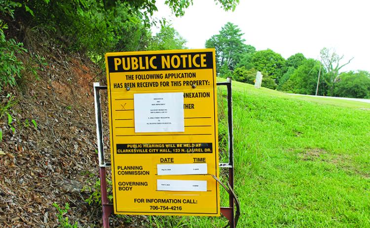 A sign marks the spot of the proposed Rocky Branch Road housing development in Clarkesville. The matter will be addressed at an Aug. 13 meeting. BRIAN WELLMEIER/Staff