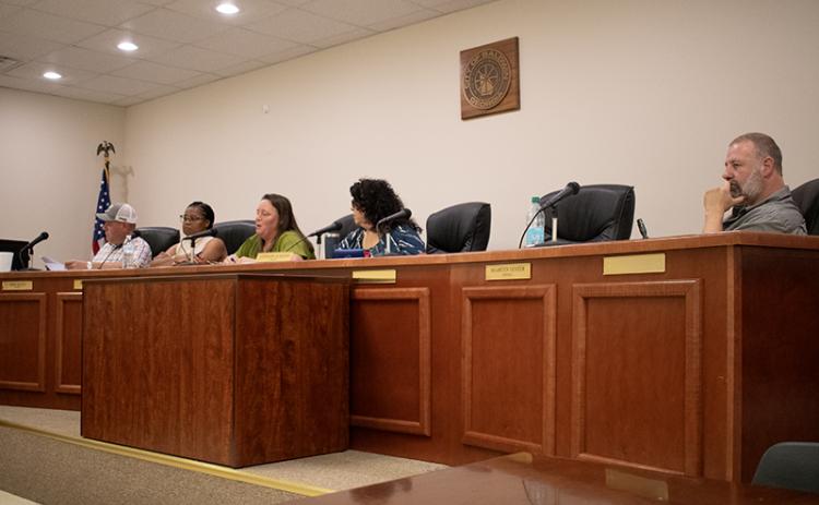 Baldwin City Council approved a county road study at its regularly scheduled council meeting Monday night. Pictured from left are Councilman Erik Keith, Councilwoman Kerri Davis, Councilwoman Alice Venter, Mayor Stephanie Almagno and Councilman Maarten Venter. JULIANNE AKERS/Staff