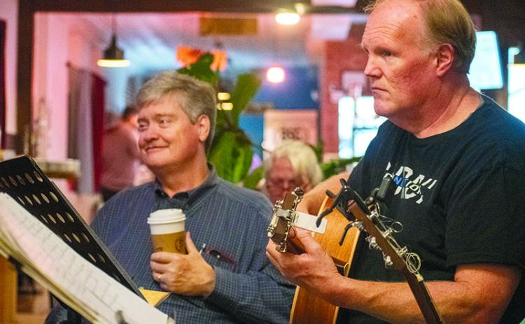 Jimmy Maness and Stan Crump share a laugh while Crump sings “Oh, Pretty Woman” by Roy Orbison. JULIANNE AKERS/Staff