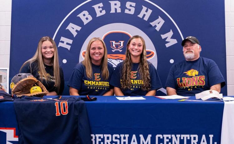 Shelby Rinefierd celebrated her commitment with family including sister Shyanne, mom Jennifer, and dad TJ. SUBMITTED