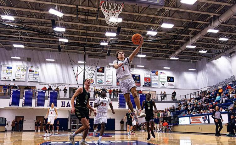 Senior guard Caden Garrison scored 6 points and came away with a steal the Habersham’s game at Stephens Friday. KAITLYN FULLER/HCHS
