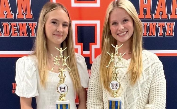 Mandi Simpson (left) and Jillian Tedder were named Cheerleaders of the Year at the Hab Central competition cheer banquet this week. SUBMITTED