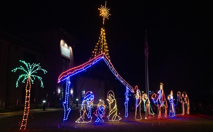 An illuminated manger scene sits outside of Cornelia City Hall. ZACH TAYLOR/Staff
