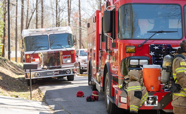 Fire engines respond to a house fire in Baldwin in early 2024. ZACH TAYLOR/Staff