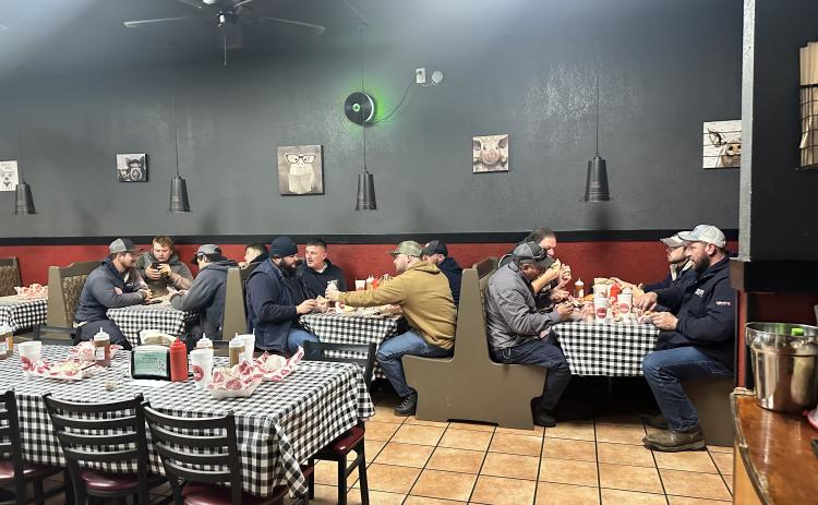 Electrical personnel and public works officials were among those served at Wolf Creek BBQ during the weekend, along with police officers and other first responder groups. Owner Mike Roberson estimates that 350 plates were served to those who attended the meal. SUBMITTED