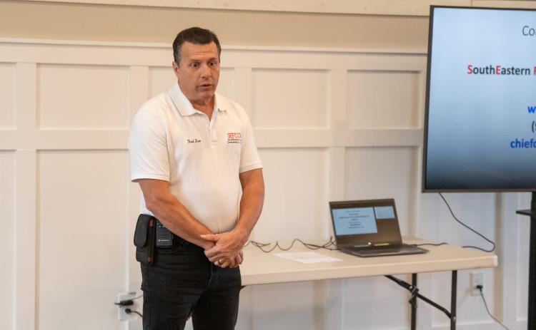 Thad Dixon of SEFCCO presents the details of the county’s approved fire consolidation study and the scope of work that will be conducted. ZACH TAYLOR/Staff