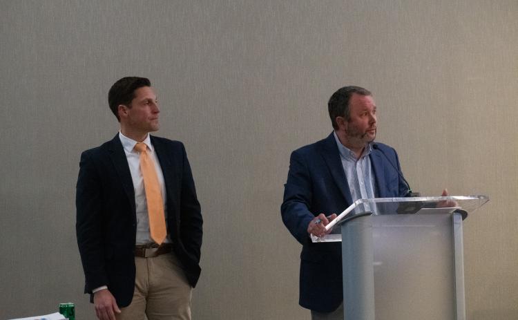 David Leenman joins Assistant Superintendent Patrick Franklin at the podium as he is recommended to serve as the next assistant superintendent. HANNAH CAUDELL/Staff