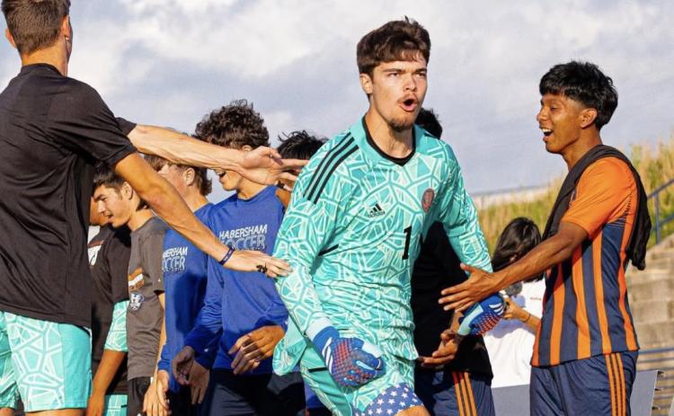 Senior Everett Rudeseal offers both leadership and a strong presence in the net as HCHS’ goalkeeper. SUBMITTED