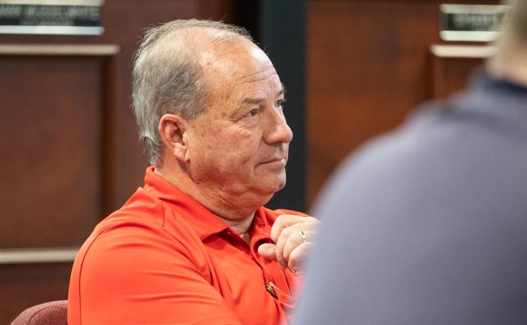 Demorest City Manager Mark Musselwhite listens intently to the Food 4 Kids presentation in Tuesday evening’s work session. Musselwhite received a three percent raise after signing a new contract on Wednesday. ZACH TAYLOR/Staff