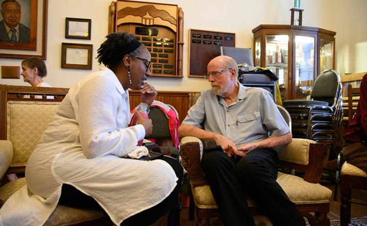 Audrey Davenport (left) speaks with Jim Johnston (right) during the ‘Think and Listen’ seminar at Sautee Nacoochee Center in honor of Juneteenth last year. The ‘Think and Listen’ session allowed patrons to voice their opinions and discuss matters about race, religion, and other topics with an engaged partner.  ZACH TAYLOR/Staff