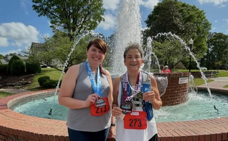 Whitney Jordan and Karen Swann (right) have become close running comrades over the past few years. SUBMITTED