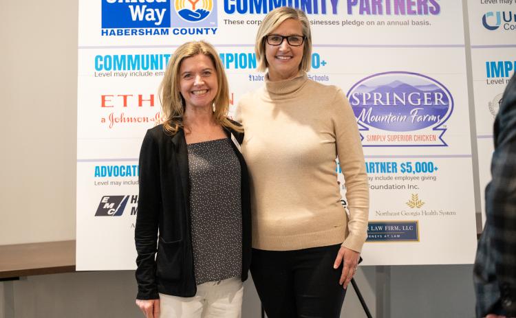 United Way Board Chairwoman Michelle Blackburn (left) stands with United Way President Candice Holcomb after the annual meeting last week. ZACH TAYLOR/Staff