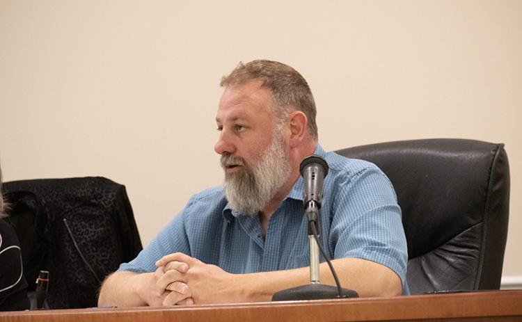 Baldwin City Councilman Maarten Venter asks some questions about the vacuum truck that the council is considering for purchase. Ultimately, the council decided to table the decision until they could further review their options. HANNAH CAUDELL/Staff