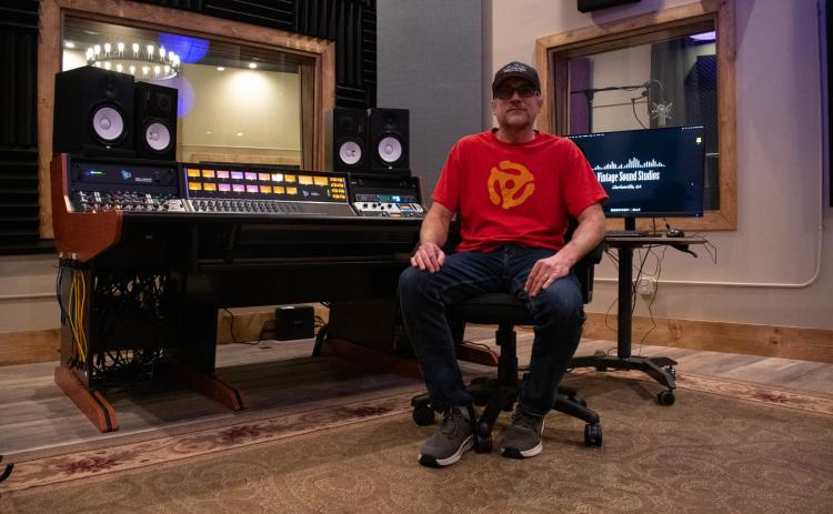 Stephen Wareham, owner of Vintage Sound Studios in Clarkesville, sits in the main studio of the brand new facility in front of the equipment he hopes to use to produce musical magic for new clients. HANNAH CAUDELL/Staff